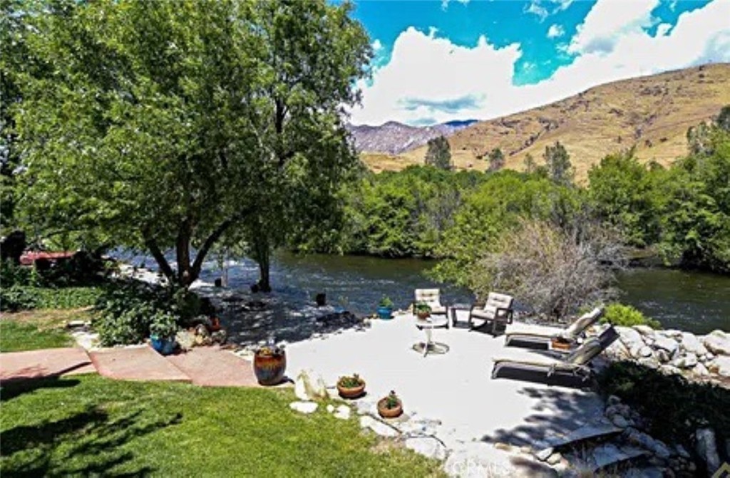 132 Rio Del Loma Kernville, CA 93238 - Photo 30 of 33 a view of a lake with a yard