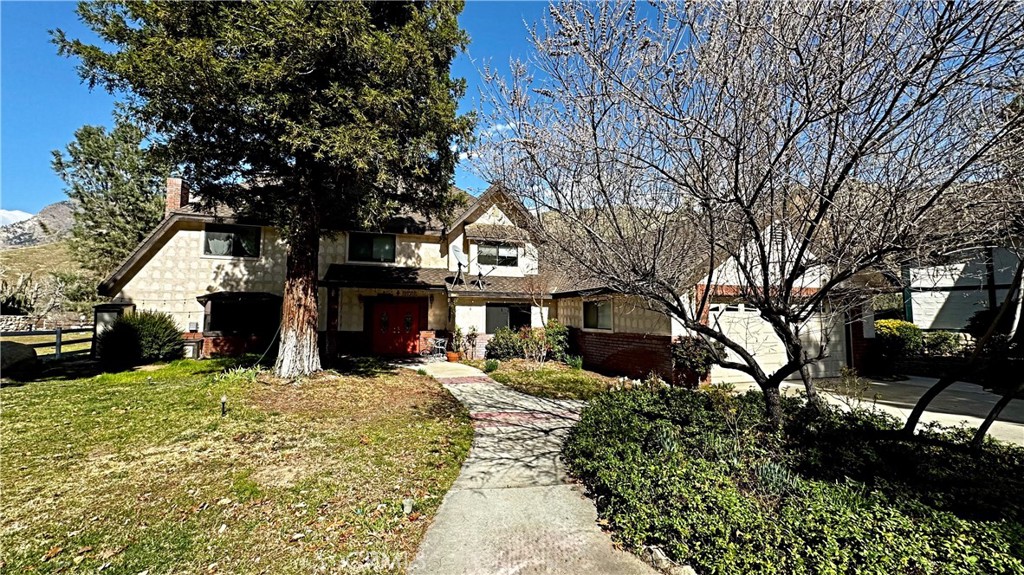 132 Rio Del Loma Kernville, CA 93238 - Photo 3 of 33 a front view of a house with a yard