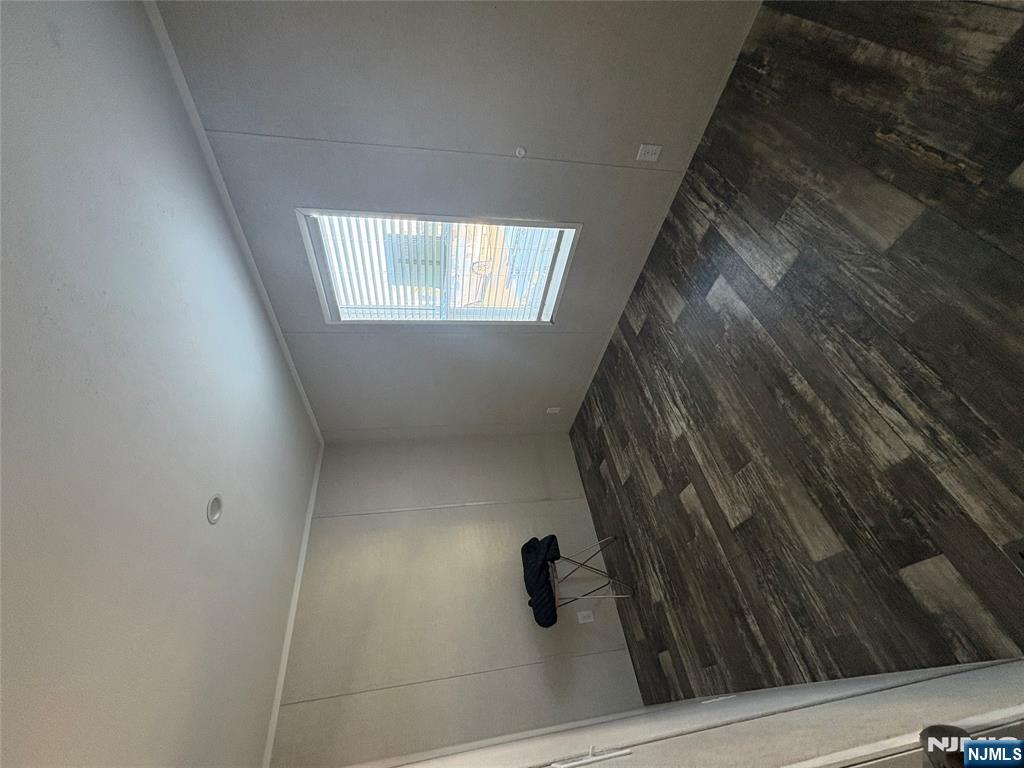 131 Elm Street Lodi, NJ 07644 - Photo 6 of 18 a room with a window