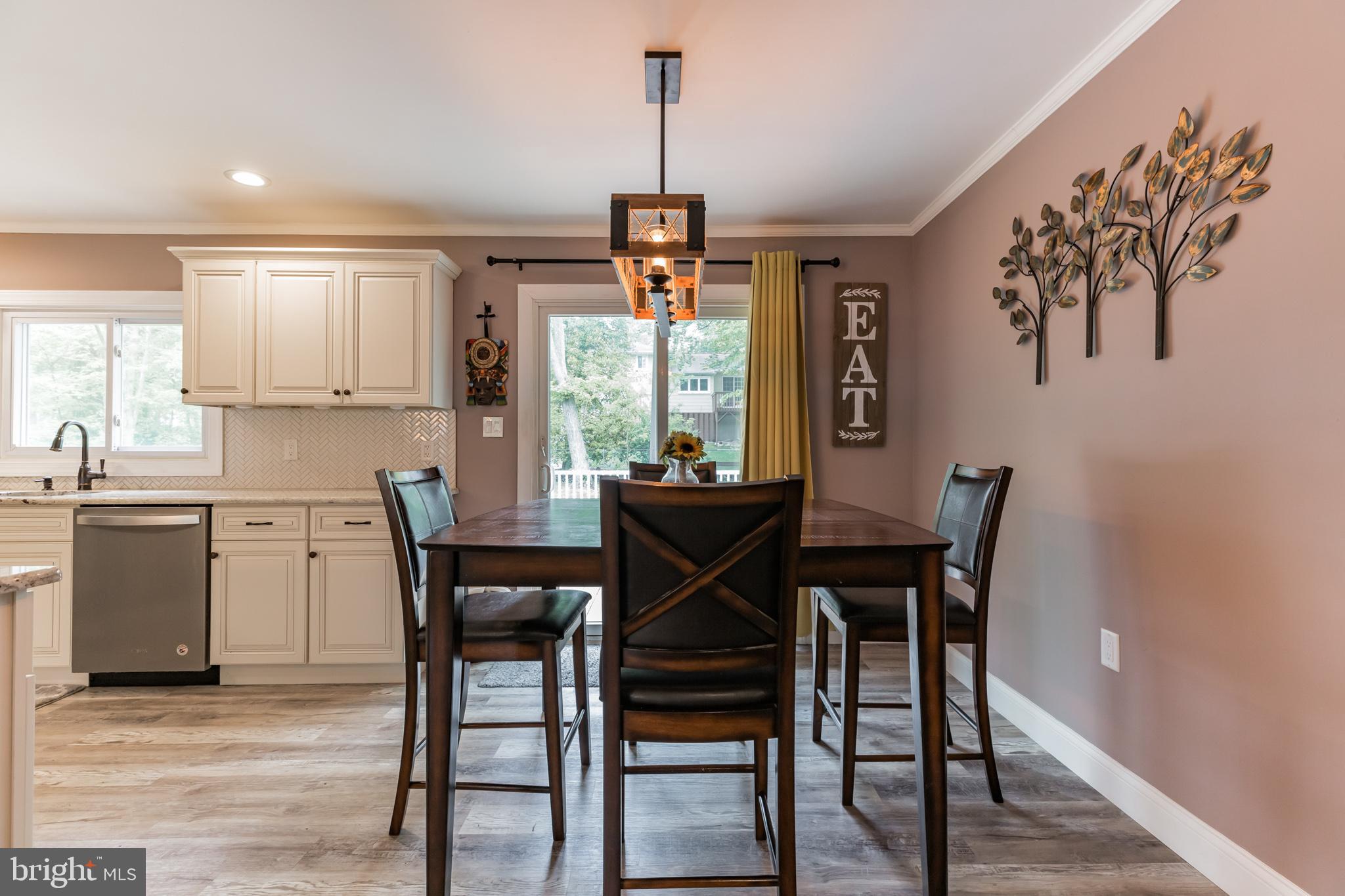 255 Winding Way Road Stratford, NJ 08084 - Photo 17 of 31 a dining room with furniture and window