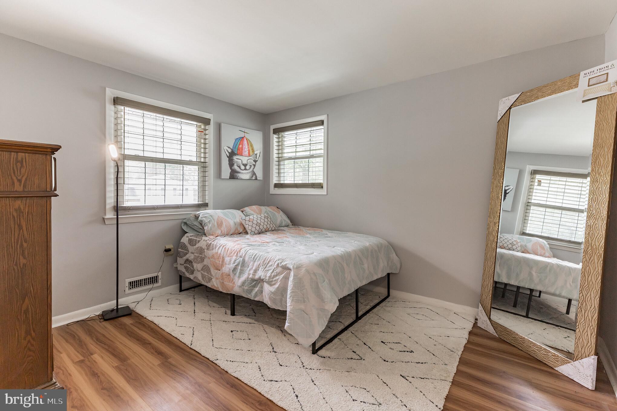 255 Winding Way Road Stratford, NJ 08084 - Photo 20 of 31 a bedroom with a bed and a window