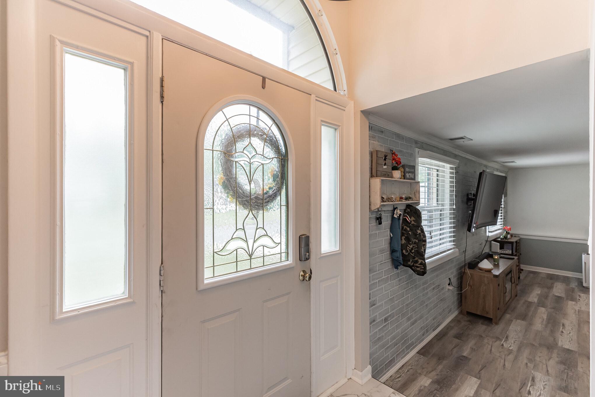 255 Winding Way Road Stratford, NJ 08084 - Photo 4 of 31 a view of a entryway door of the house