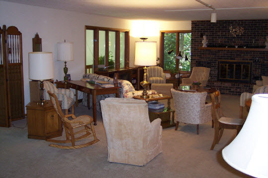 3302 South Butternut Road Oregon, IL 61061 - Photo 3 of 5 a living room with furniture a window and a fireplace