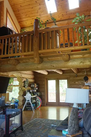 a kitchen with stainless steel appliances a sink a stove and a refrigerator