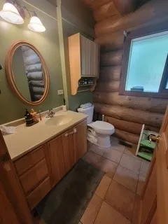 a view of swimming pool with a patio