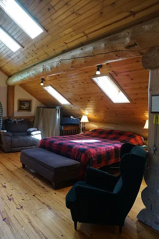 a view of a wooden deck with a bench