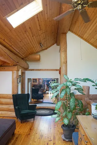a room with furniture and air hockey table