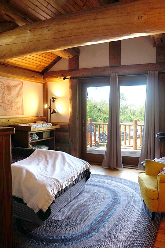 3526 East 2179th Road Ottawa, IL 61350 - Photo 30 of 58 a bed sitting in a bedroom next to a window