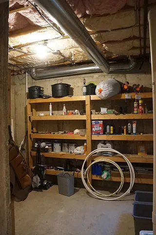 a kitchen with a stove a refrigerator and a stove