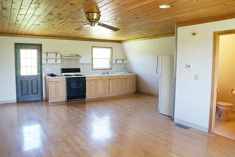 3526 East 2179th Road Ottawa, IL 61350 - Photo 46 of 58 a kitchen with a stove a refrigerator and a stove