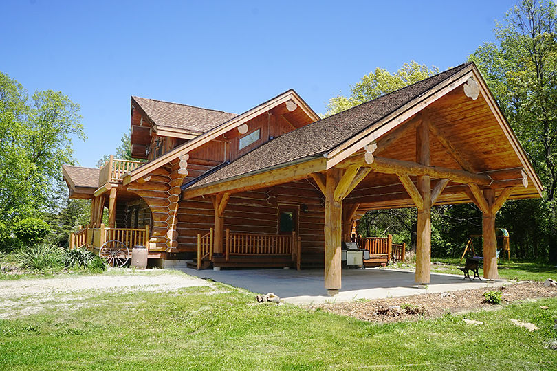 3526 East 2179th Road Ottawa, IL 61350 - Photo 6 of 58 a view of a house with a yard and floor to ceiling windows and trees