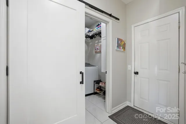 a view of living room with furniture and rug