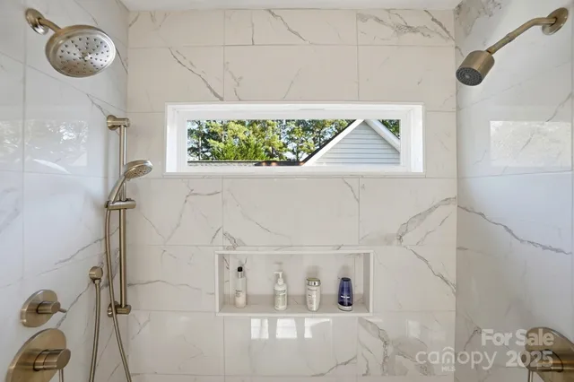 a view of a chairs and table in the patio