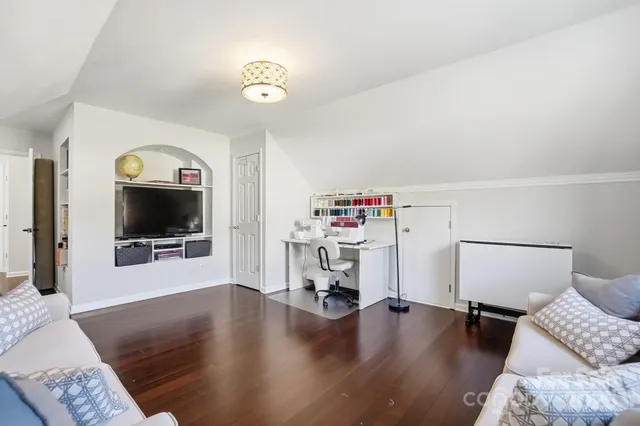 a view of a backyard with sitting area