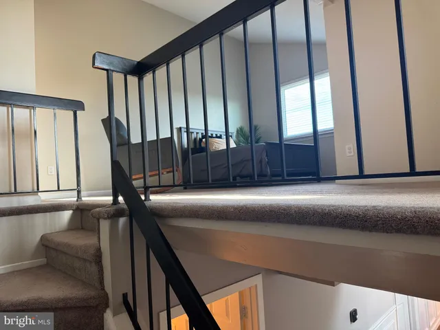 a view of balcony with furniture