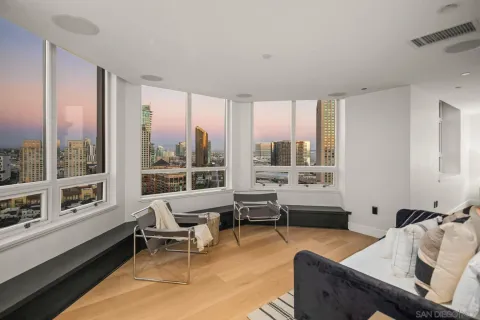 a bedroom with a bed and a night stand