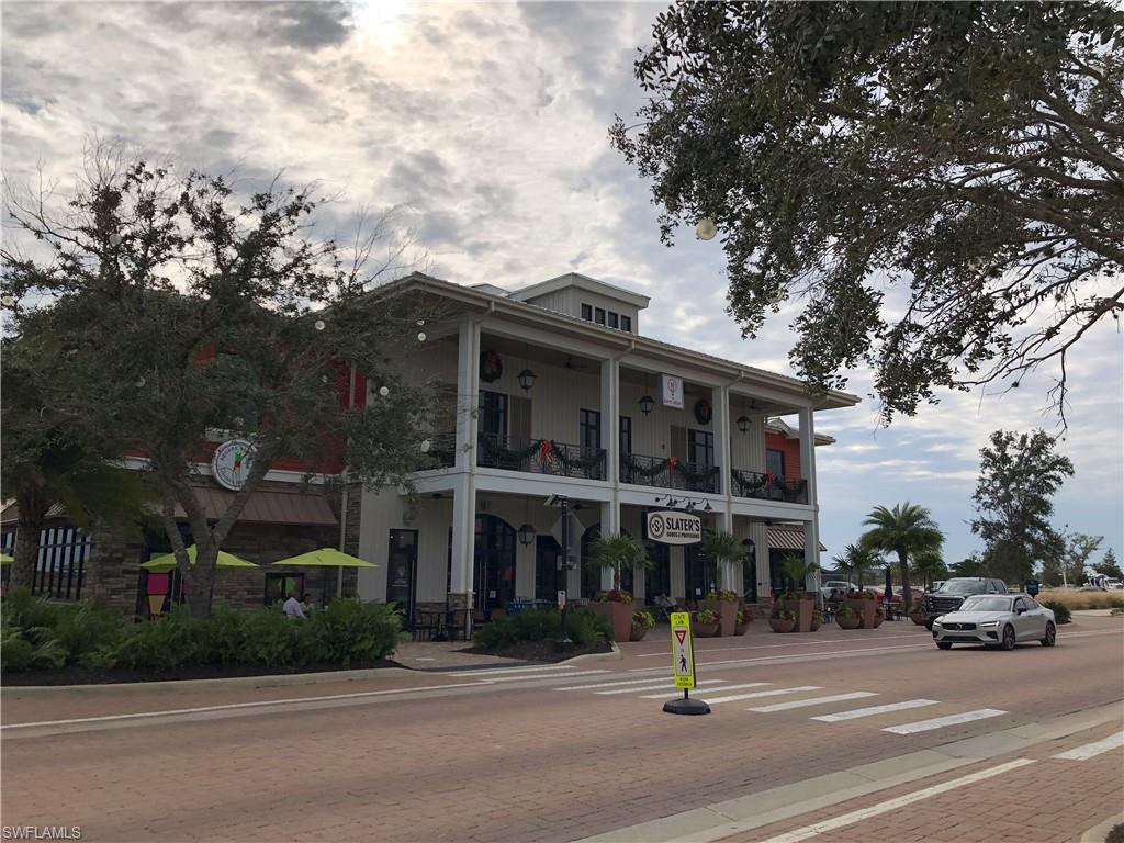 43031 Greenway Boulevard, Unit 1014 Babcock Ranch, FL 33982 - Photo 18 of 19 a view of multiple houses