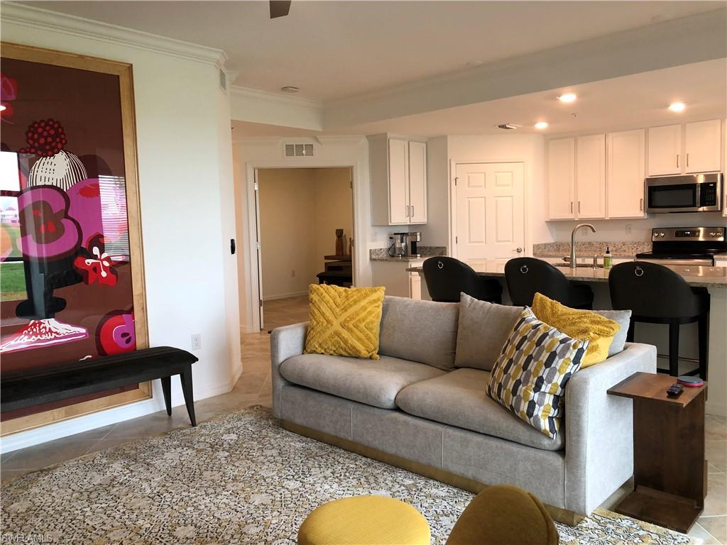 43031 Greenway Boulevard, Unit 1014 Babcock Ranch, FL 33982 - Photo 2 of 19 a living room with furniture