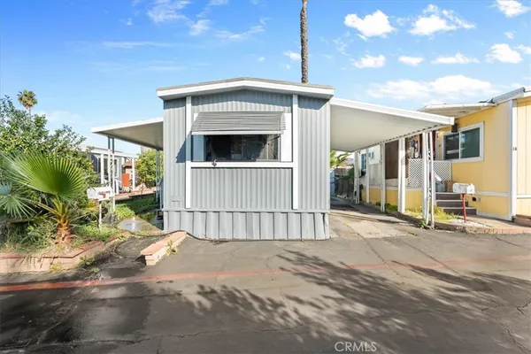 a front view of a house with a garage