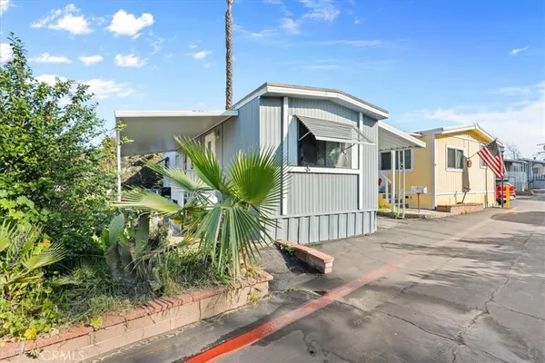 a view of a house with a park