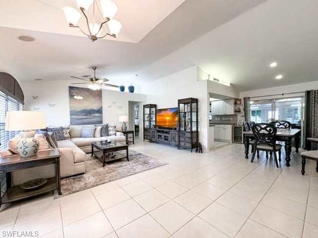 3790 35th Avenue Northeast Naples, FL 34120 - Photo 19 of 27 a living room with furniture and a flat screen tv