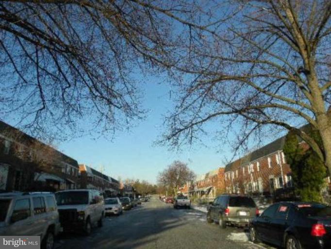 4842 Greencrest Road Baltimore, MD 21206 - Photo 2 of 14 a view of city street with a parked car