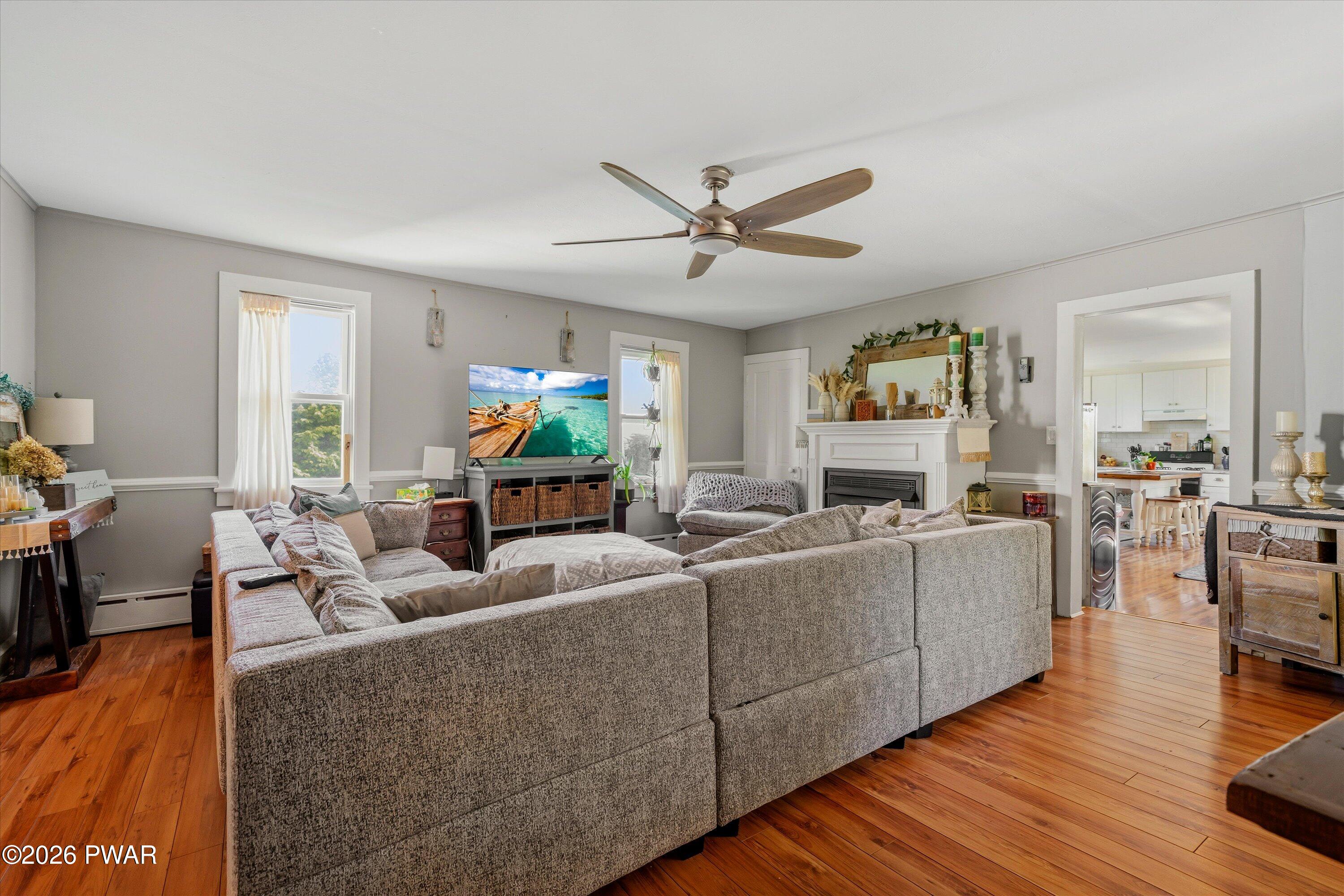 127 Valleyview Road Greentown, PA 18426 - Photo 19 of 66 a living room with furniture and a large window