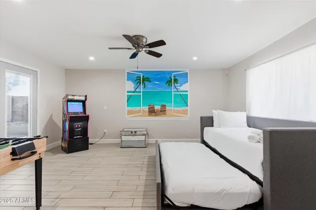 a view of a livingroom with furniture and a workspace