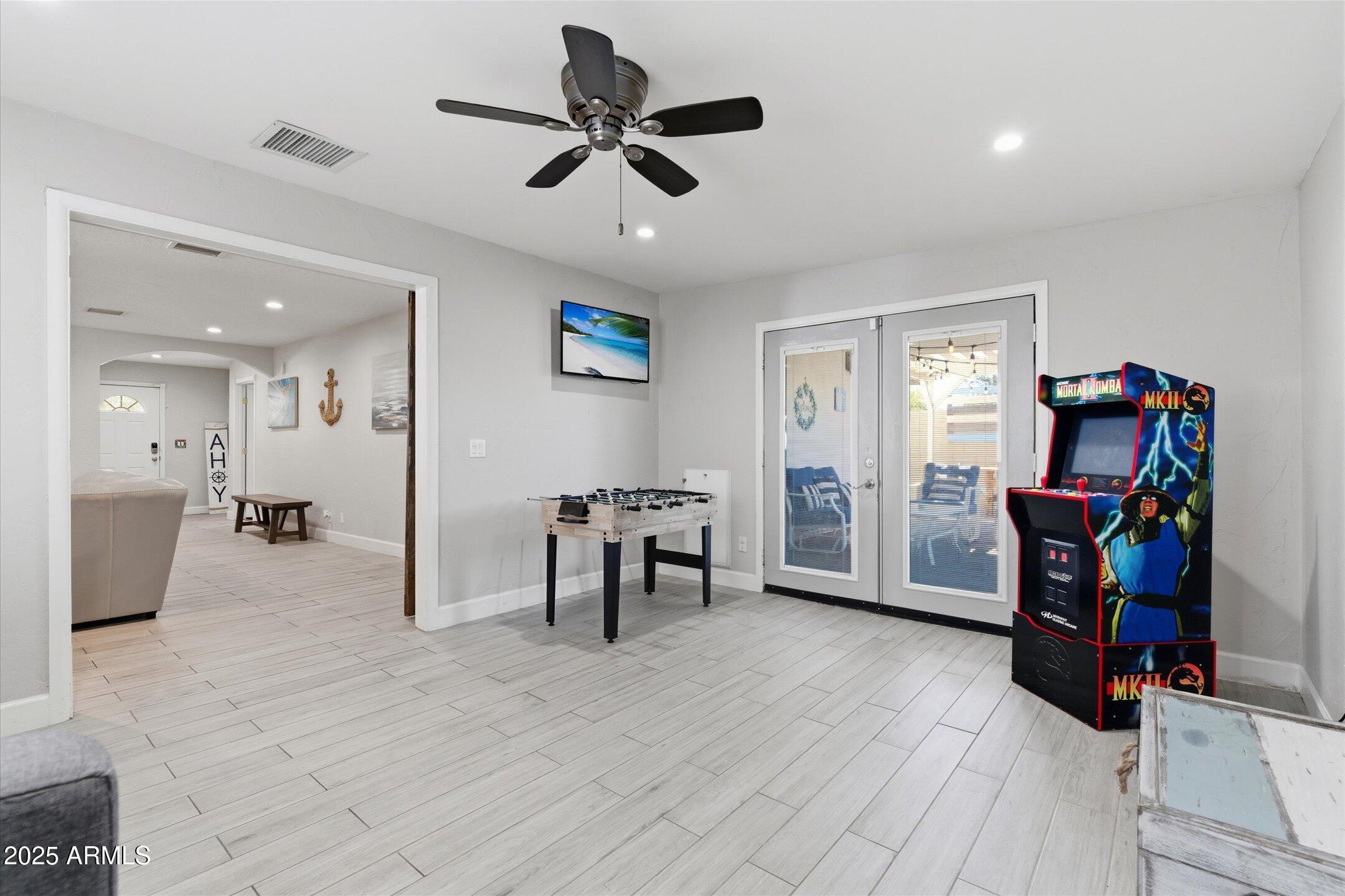 2530 North 68th Place Scottsdale, AZ 85257 - Photo 27 of 52 a view of a livingroom with furniture and a workspace