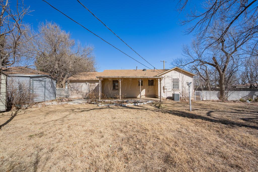 1606 Tularosa Street Amarillo, TX 79102 - Photo 19 of 22 a view of house with yard and covered with snow