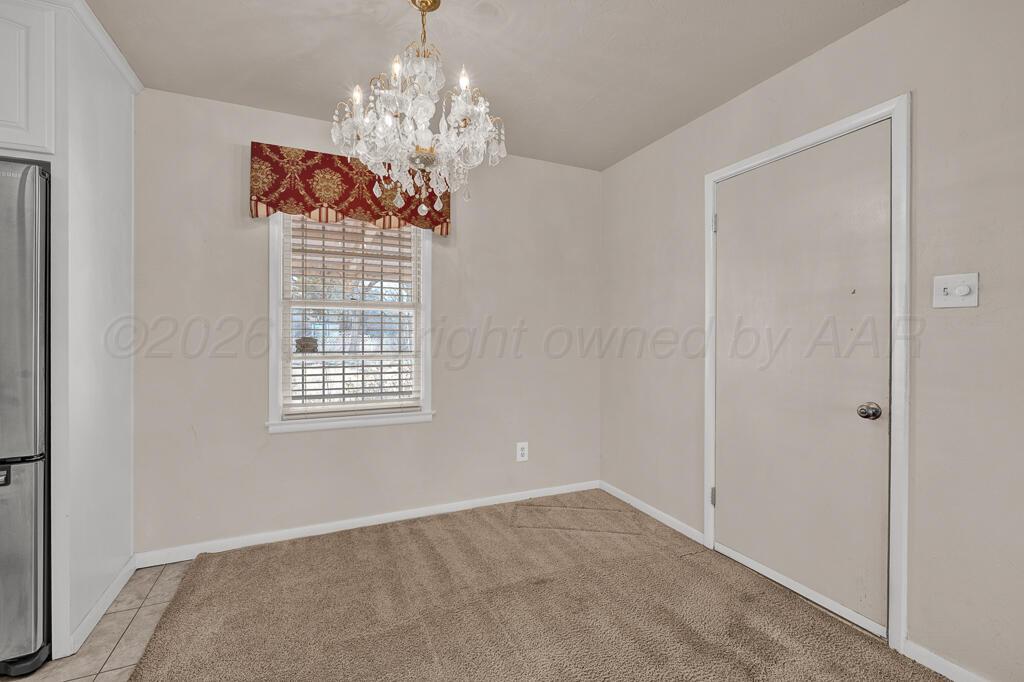 1606 Tularosa Street Amarillo, TX 79102 - Photo 4 of 22 a view of livingroom with window
