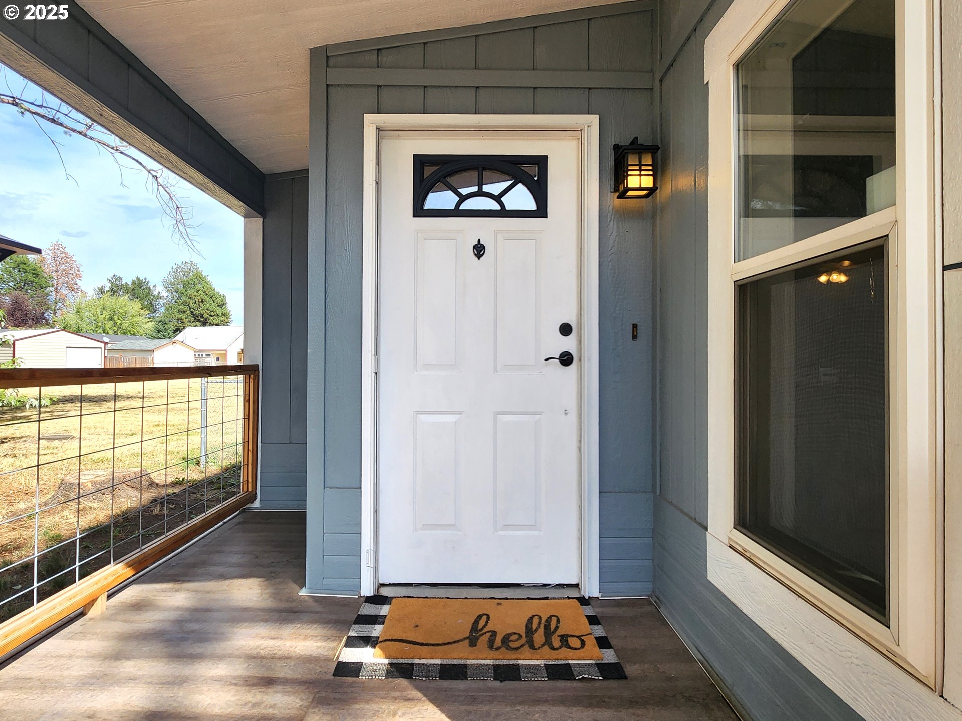 1809 26th Street, Unit 21 La Grande, OR 97850 - Photo 4 of 18 a view of an entryway with wooden floor