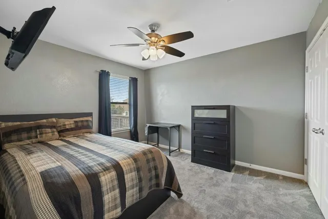 a view of a field with an trees