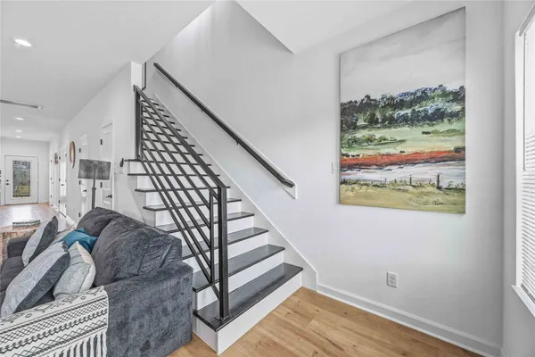 a view of entryway with wooden floor