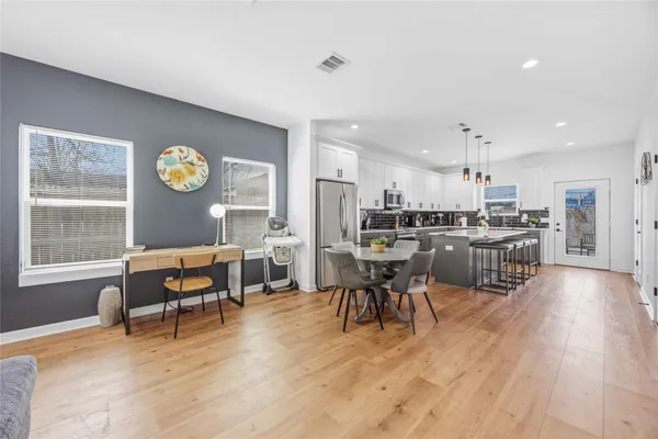 a living room with furniture and a table