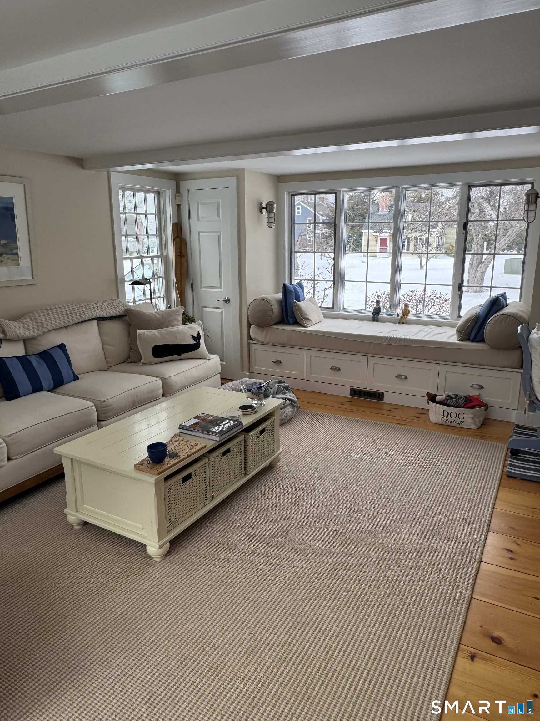 84 Waterside Lane, Unit 3 Clinton, CT 06413 - Photo 15 of 37 a living room with furniture and a large window