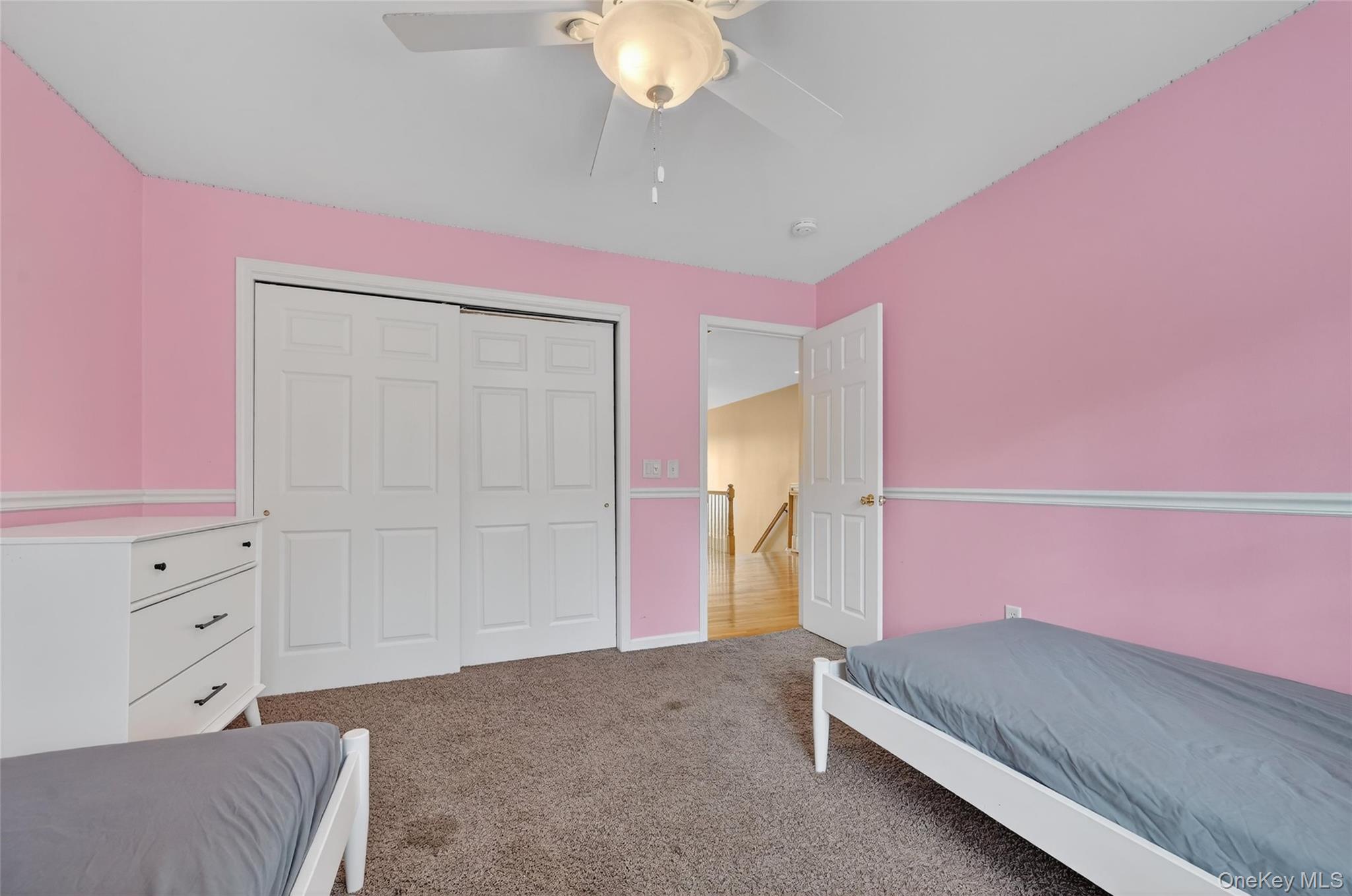 1071 Craigville Road Chester, NY 10918 - Photo 27 of 48 Bedroom with dark colored carpet, a ceiling fan, and a closet