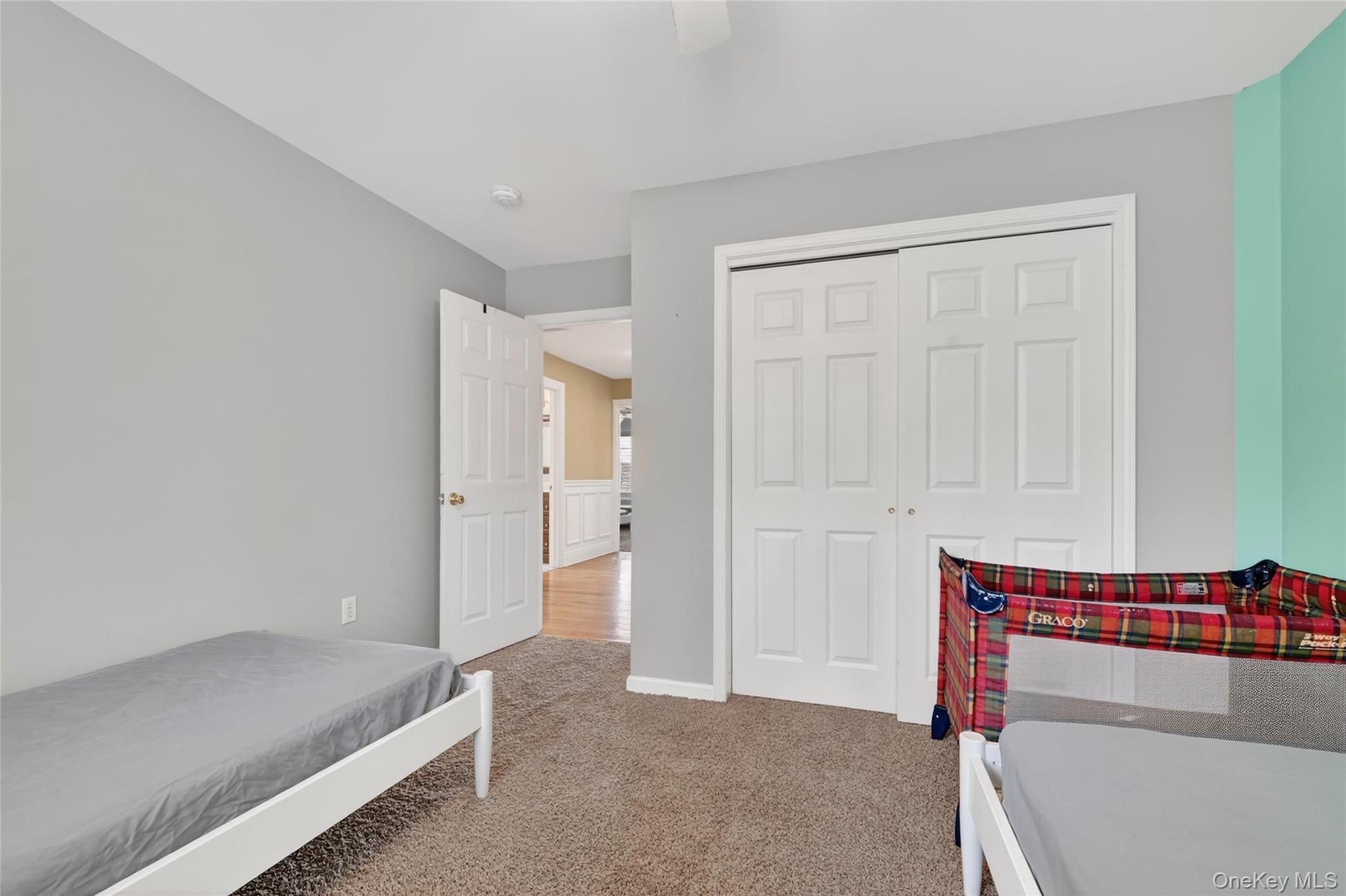 1071 Craigville Road Chester, NY 10918 - Photo 29 of 48 Bedroom featuring light carpet, ceiling fan, and a closet
