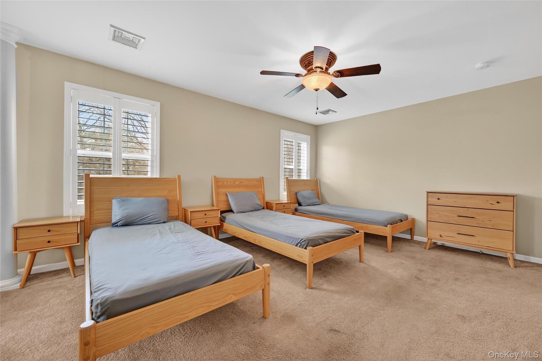 1071 Craigville Road Chester, NY 10918 - Photo 31 of 48 Bedroom with light carpet and ceiling fan