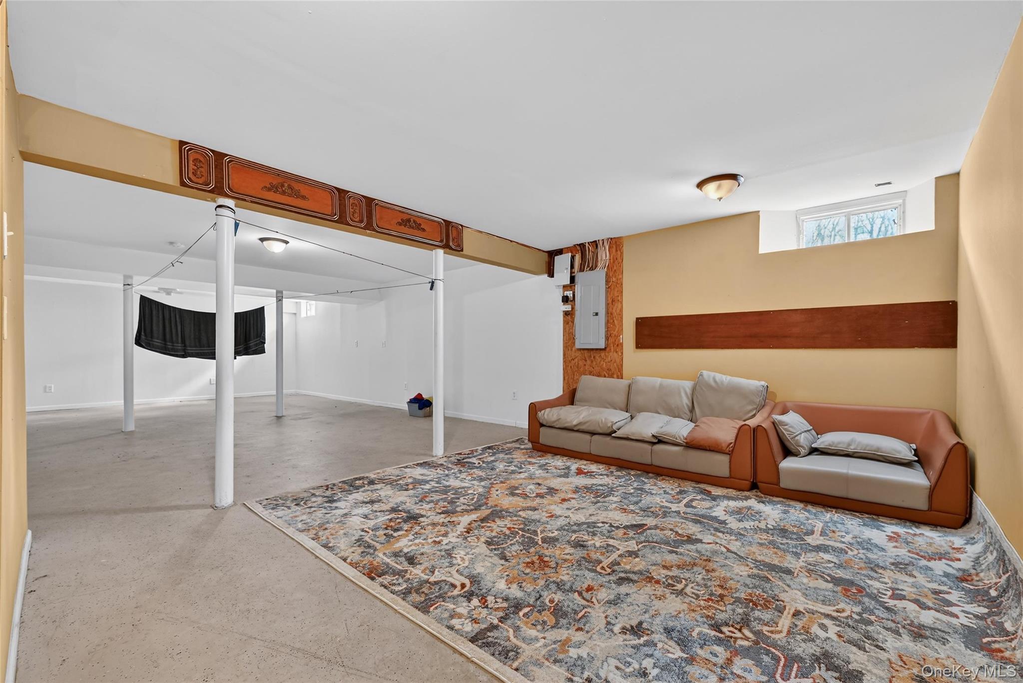 1071 Craigville Road Chester, NY 10918 - Photo 38 of 48 Living area with concrete flooring and electric panel