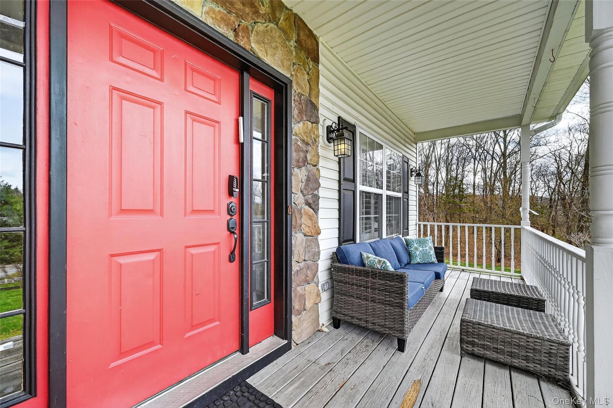 1071 Craigville Road Chester, NY 10918 - Photo 6 of 48 Property entrance featuring stone siding, a porch, and an outdoor hangout area