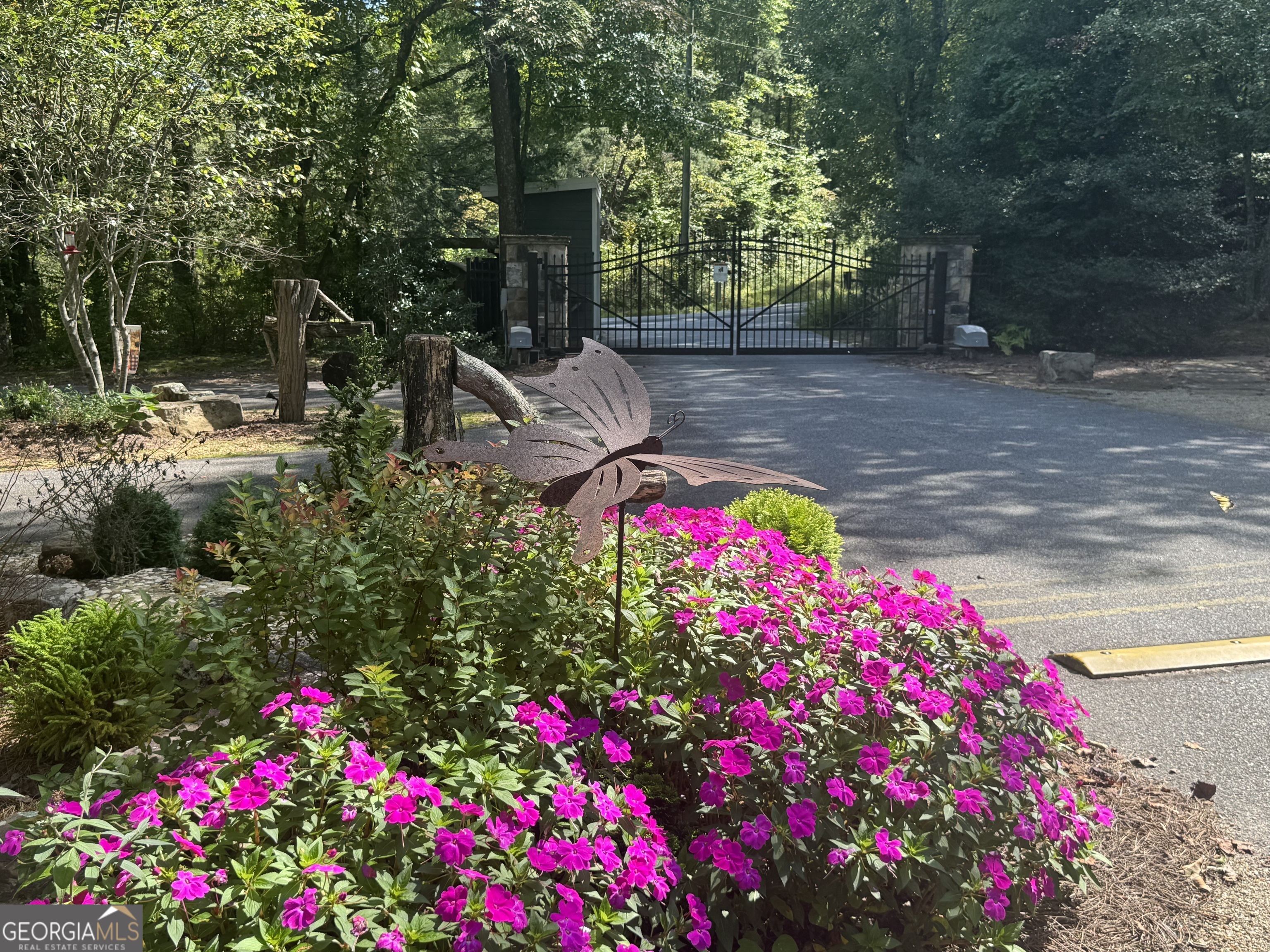 4960 Laurel Lodge Road Clarkesville, GA 30523 - Photo 15 of 21 a view of yard with flowers and tree
