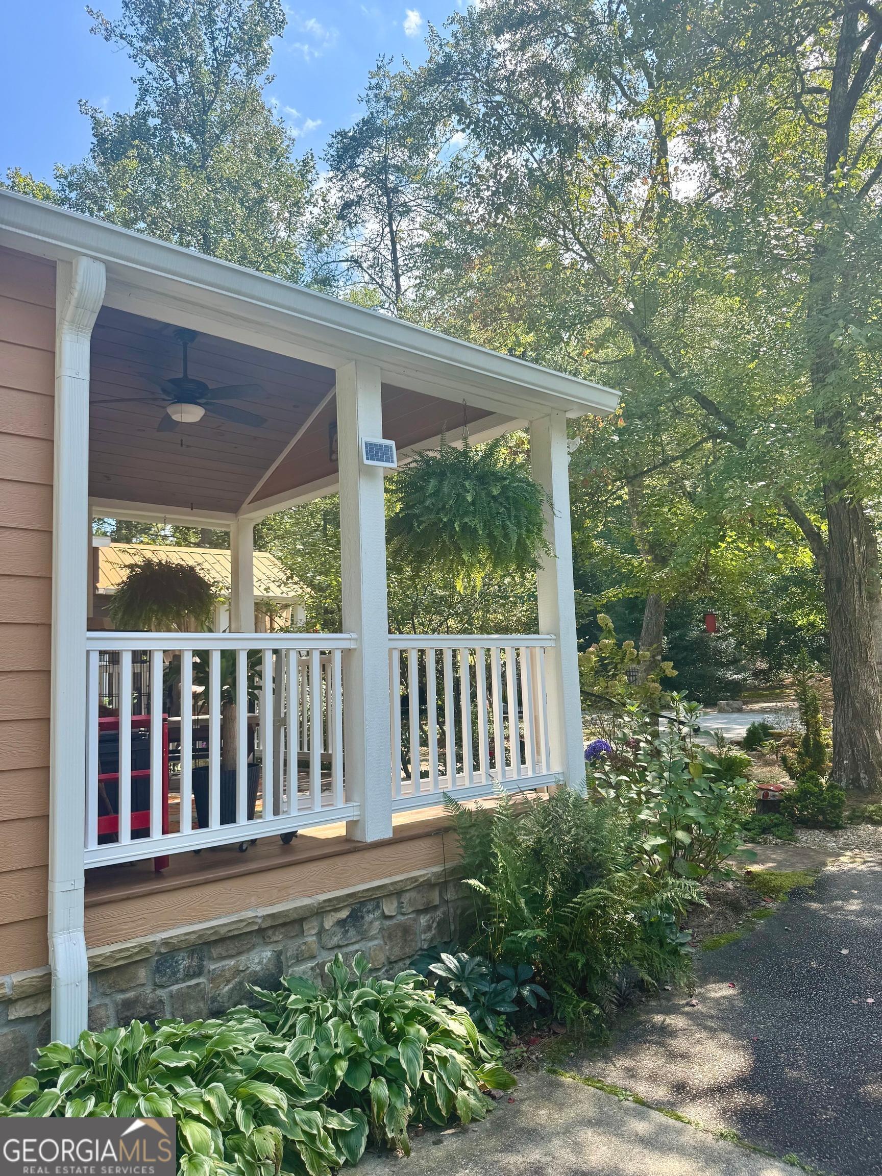 4960 Laurel Lodge Road Clarkesville, GA 30523 - Photo 16 of 21 a view of a porch with a yard
