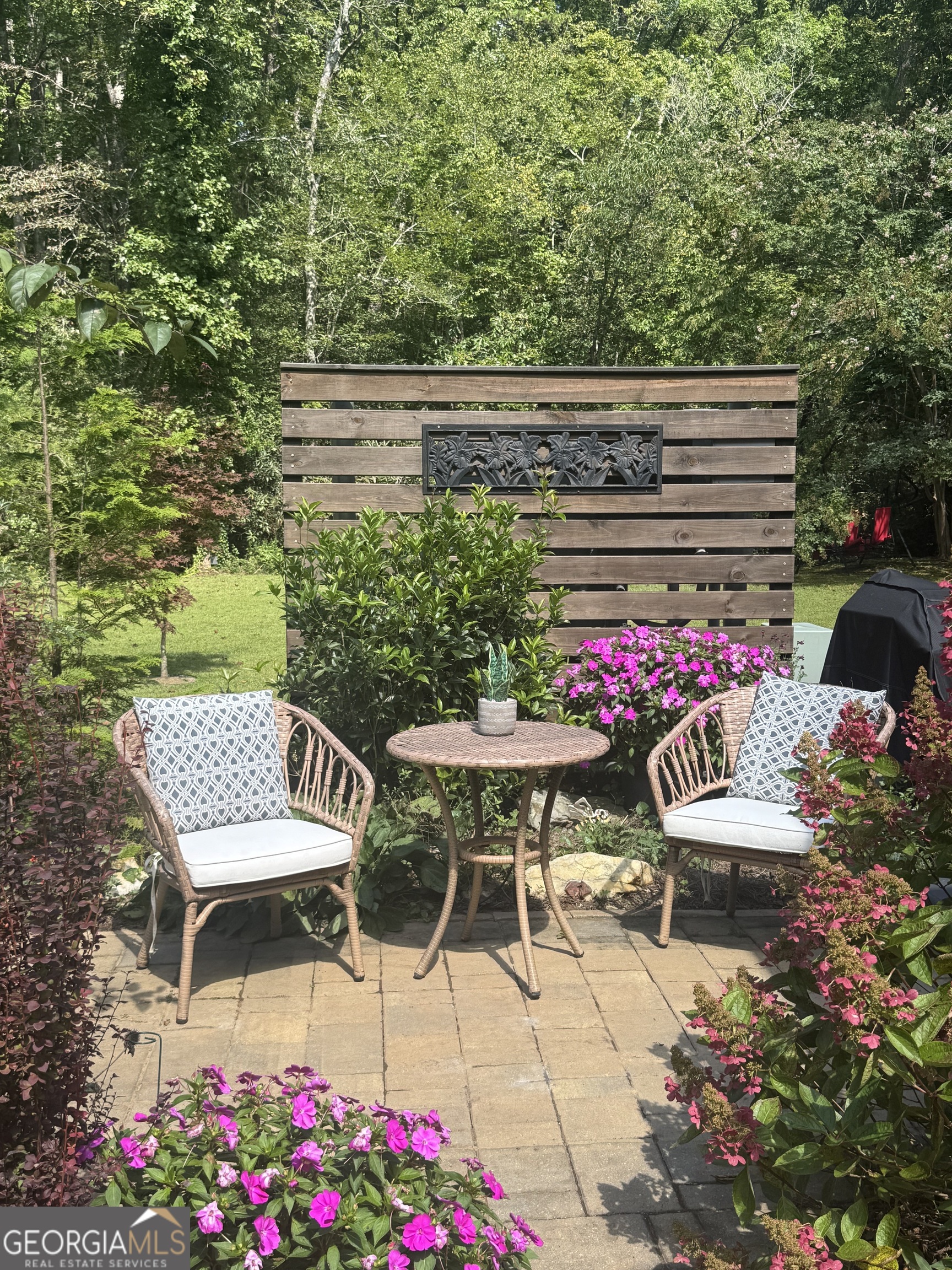 4960 Laurel Lodge Road Clarkesville, GA 30523 - Photo 2 of 19 a view of a chairs and table in the patio
