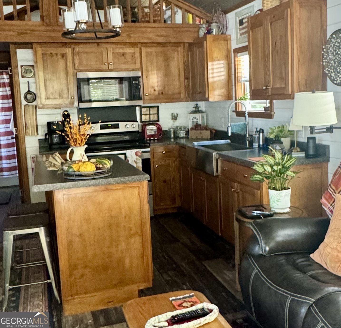 4960 Laurel Lodge Road Clarkesville, GA 30523 - Photo 7 of 19 a kitchen with sink refrigerator and window