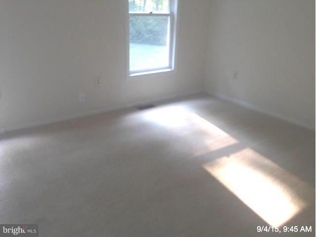3772 Roop Road New Windsor, MD 21776 - Photo 3 of 10 an empty room that has a window