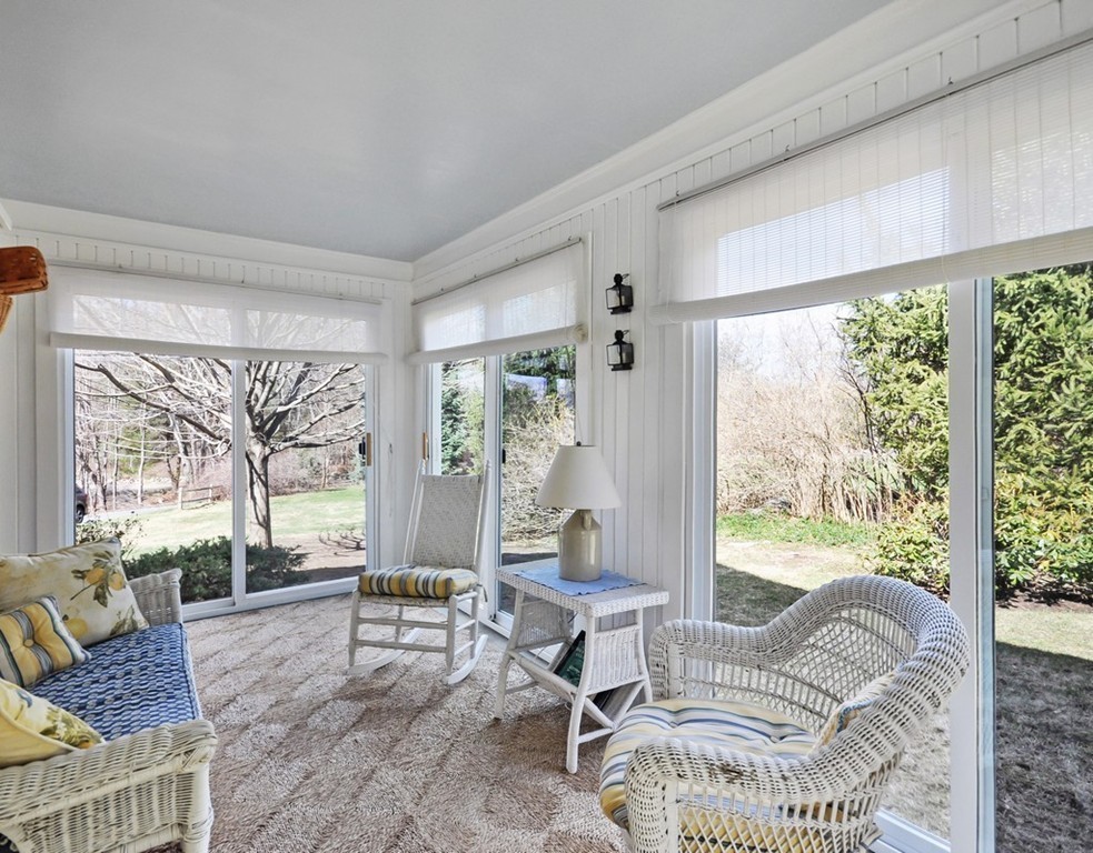 51 Harvard Road Stow, MA 01775 - Photo 14 of 17 a living room with furniture and a large window
