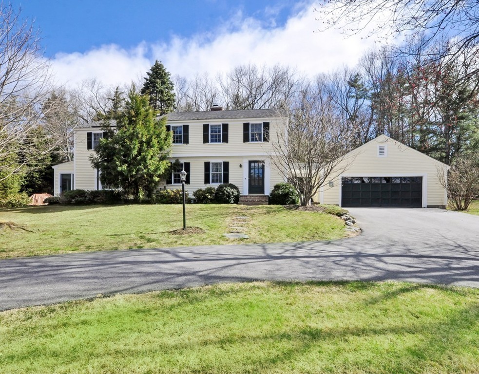 51 Harvard Road Stow, MA 01775 - Photo 2 of 17 a front view of a house with a yard