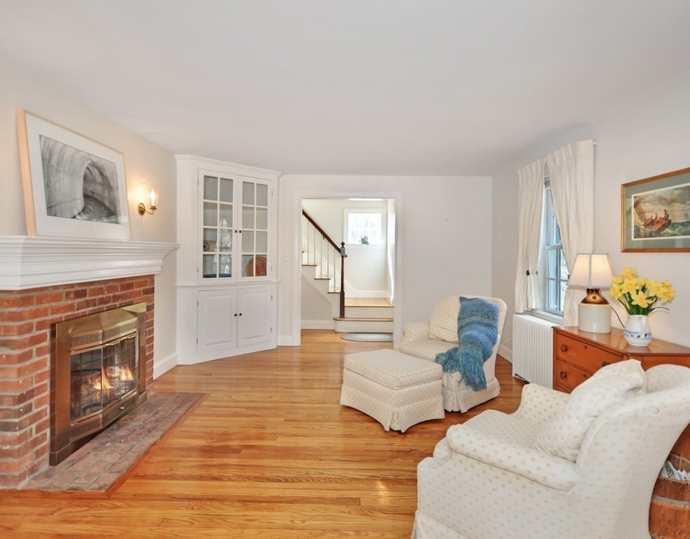 51 Harvard Road Stow, MA 01775 - Photo 8 of 17 a living room with couches and a fireplace