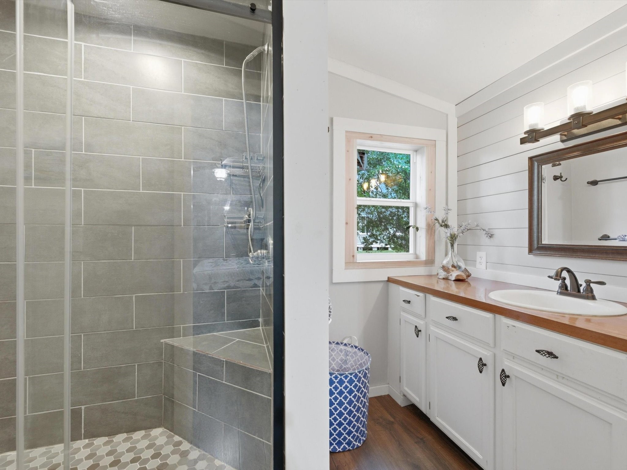 27855 Kresdorn Road Hockley, TX 77447 - Photo 10 of 24 a bathroom with a shower sink and mirror